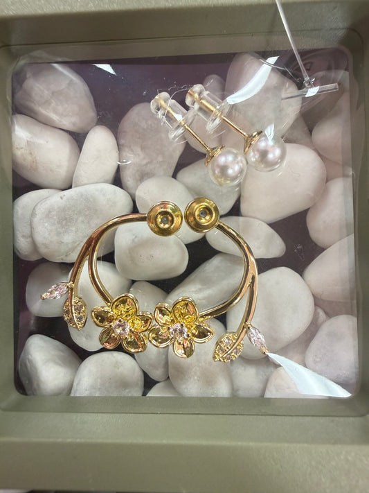 flowers and pearl earring